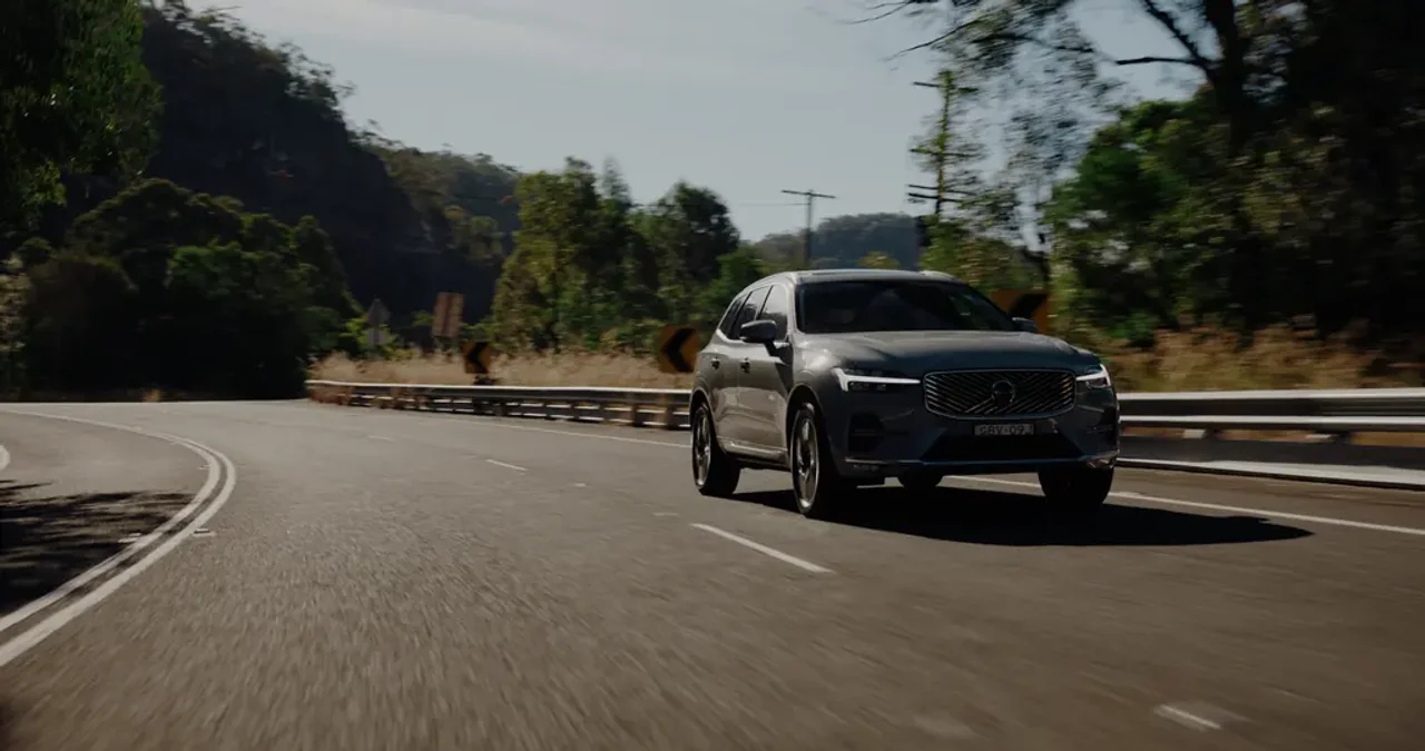 Volvo XC60 mild-hybrid SUV cruising the open freeway