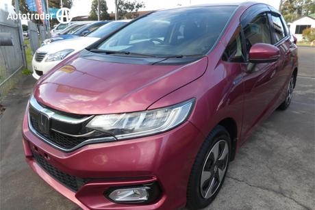 Pink 2017 Honda Fit Hatchback (Hybrid)