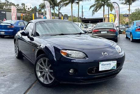 Purple 2006 Mazda MX-5 Roadster Coupe