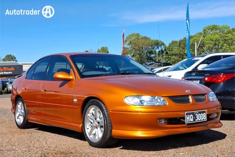 Orange 2000 Holden Commodore Sedan Ss