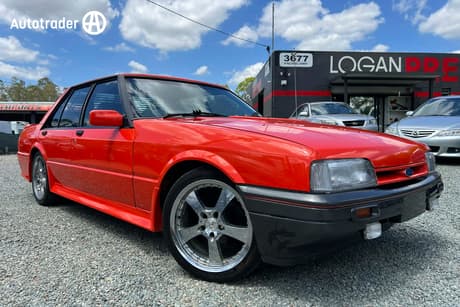 Orange 1985 Ford Falcon Sedan S-Pak