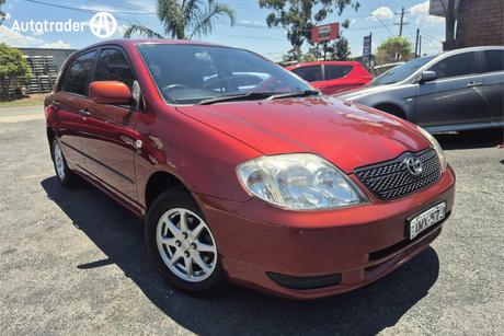 Red 2002 Toyota Corolla Hatchback Ascent Seca