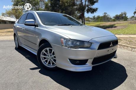 Silver 2009 Mitsubishi Lancer Sedan Vr-X