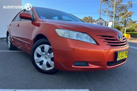 Red 2009 Toyota Camry Sedan Altise