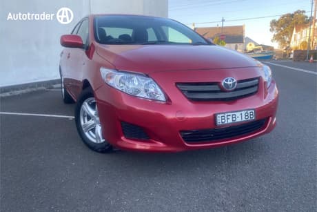 Red 2007 Toyota Corolla Sedan Ascent