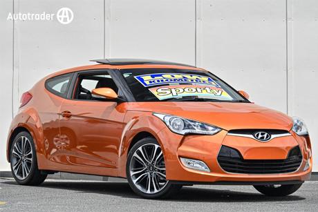 Orange 2015 Hyundai Veloster Coupe +