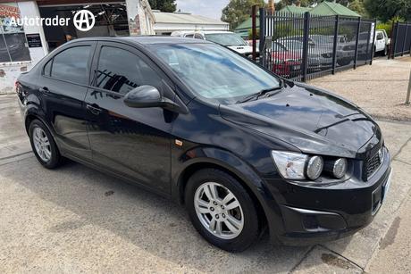Black 2013 Holden Barina Sedan Cd