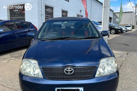 Blue 2004 Toyota Corolla Sedan Conquest