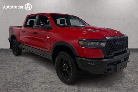 Red 2025 RAM 1500 Crew Cab Utility Rebel Hurricane