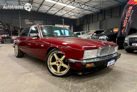 Red 1990 Jaguar XJ6 Sedan
