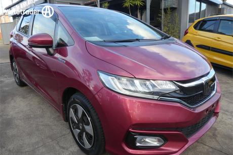 Pink 2017 Honda Fit Hatchback (Hybrid)