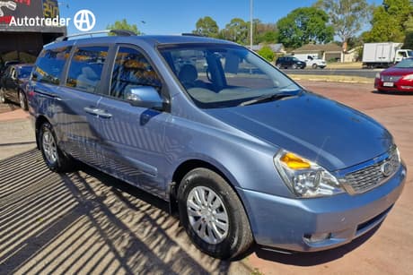 Blue 2010 Kia Grand Carnival Wagon Platinum