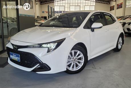 White 2023 Toyota Corolla Hatchback Ascent Sport