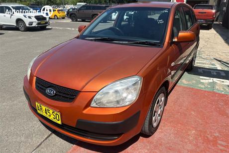 Orange 2007 Kia RIO Hatchback Lx