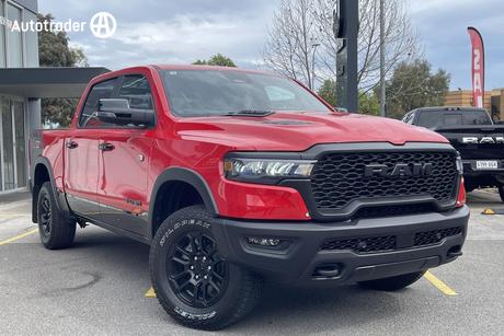 Red 2025 RAM 1500 Crew Cab Utility Rebel Hurricane