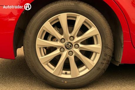 Red 2019 Toyota Camry Sedan Ascent Sport (Hybrid)