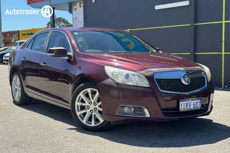 Red 2013 Holden Malibu Sedan EM CDX SEDAN 4DR SPTS AUTO 6SP 2.0DT [MY13]