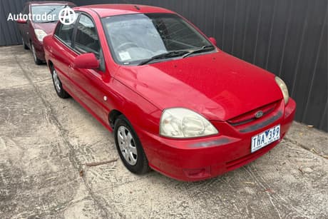 Red 2004 Kia RIO Sedan