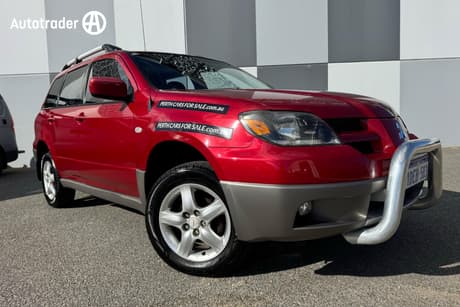 Red 2003 Mitsubishi Outlander Wagon Ls