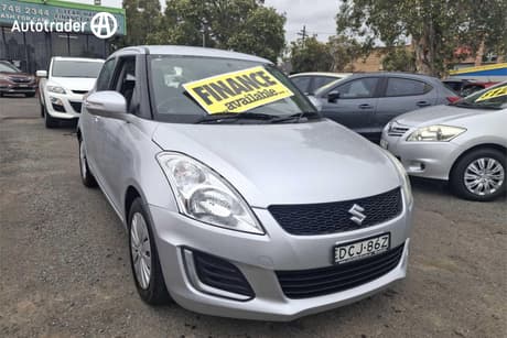 Silver 2015 Suzuki Swift Hatchback Gl
