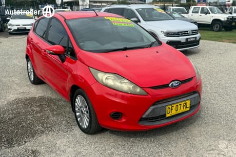 Red 2013 Ford Fiesta Sedan LX WT