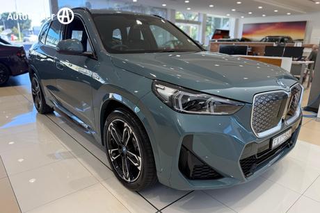 Green 2024 BMW IX1 Wagon Xdrive30 M Sport