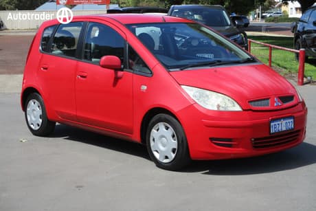 Red 2004 Mitsubishi Colt Hatchback Ls