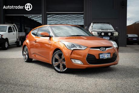 Orange 2012 Hyundai Veloster Coupe +