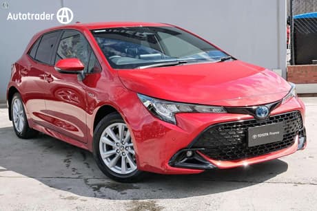 Red 2024 Toyota Corolla Hatchback Sx Hybrid