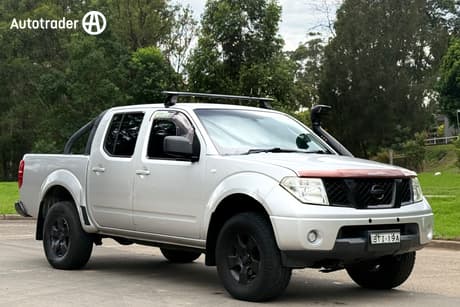 Silver 2010 Nissan Navara Dual Cab Pick-up St (4X4)