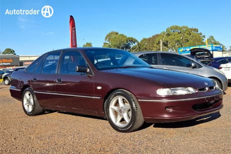 Red 1995 Holden Commodore Sedan Executive