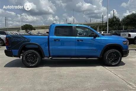 Blue 2025 RAM 1500 Crew Cab Utility Rebel Hurricane