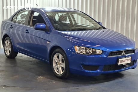 Blue 2013 Mitsubishi Lancer Sedan Es