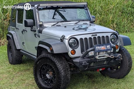 Silver 2012 Jeep Wrangler Softtop Unlimited Sport (4X4)