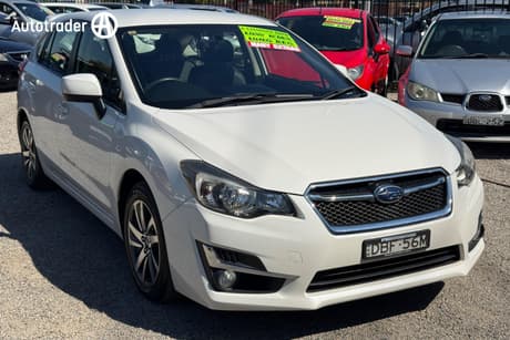 White 2015 Subaru Impreza Hatchback 2.0I Premium (Awd)
