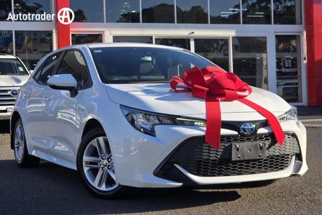 White 2021 Toyota Corolla Hatchback Ascent Sport Hybrid