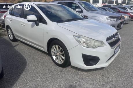 White 2014 Subaru Impreza Hatchback 2.0I (Awd)