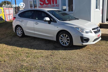 White 2015 Subaru Impreza Hatchback 2.0I (Awd)