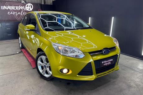 Yellow 2011 Ford Focus Hatchback Trend