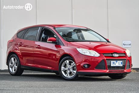 Red 2012 Ford Focus Sedan Trend