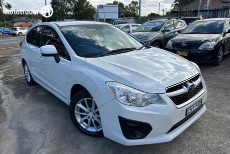 White 2013 Subaru Impreza Hatchback 2.0I (Awd)