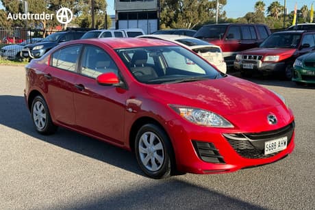 Red 2010 Mazda 3 Sedan Neo