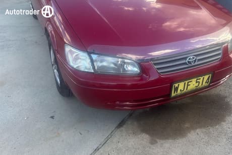 Red 1999 Toyota Camry Sedan Csi