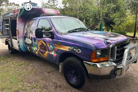 Purple 2003 Ford F350 Crew Cab Chassis Xlt