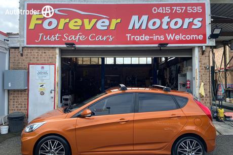 Orange 2015 Hyundai Accent Hatchback Active