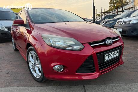 Red 2015 Ford Focus Hatchback Trend