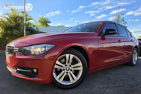 Red 2012 BMW 320D Sedan