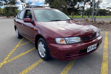 Red 1998 Nissan Pulsar Sedan Lx