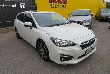 White 2016 Subaru Impreza Hatchback 2.0P Premium (Awd)
