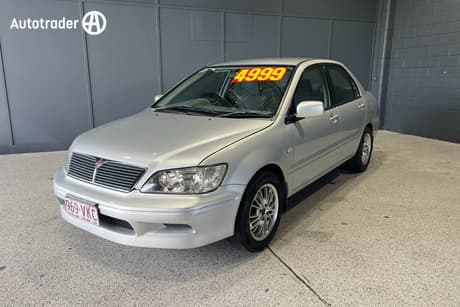 Silver 2002 Mitsubishi Lancer Sedan Ls